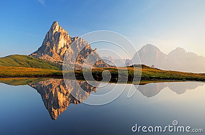 Mountain lake reflection, Dolomites, Passo Giau Stock Photo