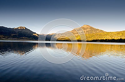 Mountain lake sunset reflect Stock Photo