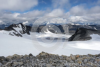 Mountain landscape as seen from Glittertind mountain slope in Northern direction. Lom, Norway Stock Photo