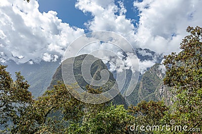 Mountain landscape background with peruvian Andes mountains in the clouds Stock Photo