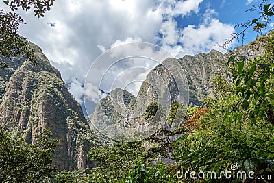 Mountain landscape background with peruvian Andes mountains in the clouds Stock Photo