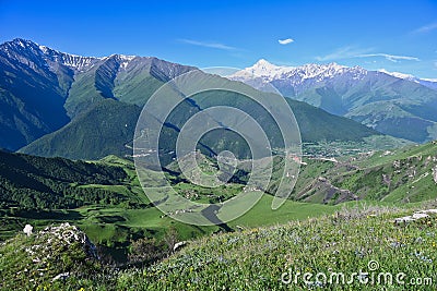 Mountain landscape of the Dzheyrakh valley with a view of Mount Kazbek Stock Photo