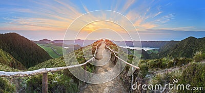 Mountain landscape with hiking trail and view of beautiful lakes, Ponta Delgada, Sao Miguel Island, Azores, Portugal Stock Photo