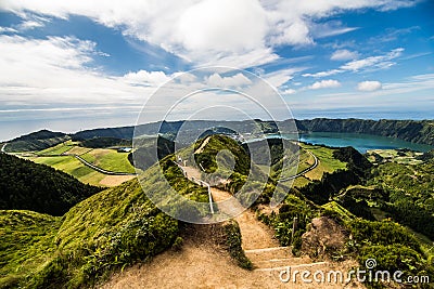 Mountain landscape with hiking trail and view of beautiful lakes Ponta Delgada, Sao Miguel Island, Azores, Portugal. Stock Photo