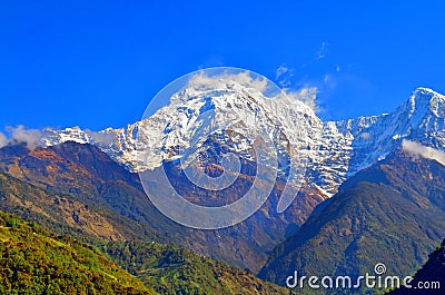 Mountain Landscape in Himalaya. Annapurna South peak, Nepal, view from Landruk. Stock Photo