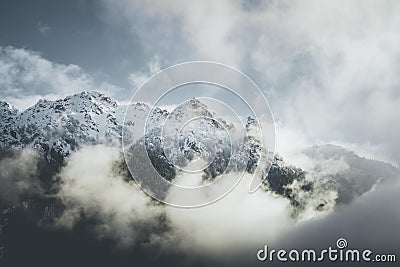 Mountain landscape with low clouds winter mood Stock Photo