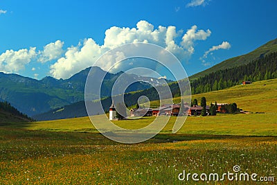 Mountain landscape with municipality of Sertig Dorfli Stock Photo