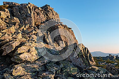 Mountain landscape in the rays of the rising sun Stock Photo