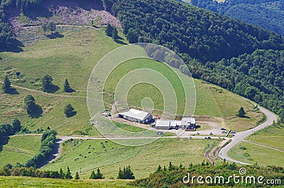 Mountain landscape with road and cottages.Village in mountain va Stock Photo