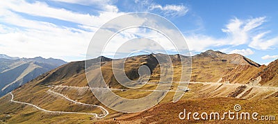 Mountain landscape with white sutra streamer scattered on the gr Stock Photo