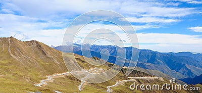 Mountain landscape with white sutra streamer scattered on the gr Stock Photo