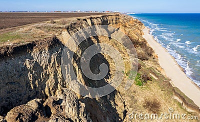 Mountain landslide in an environmentally hazardous area. Large crack in ground, descent of large layers of dirt. Deadly danger at Stock Photo