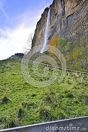 Mountain Lauterbrunnen waterfall at Swiss Alps Stock Photo