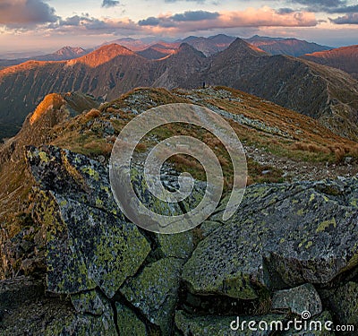 Mountain panorama landscape at dramatic sunset. Alpine tourism and beautiful experiences. Stock Photo