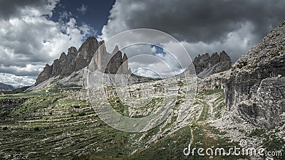 Mountain panorama with Three Peaks and Paternkofel mountain summits and old shed in the Dolomite Alps in South Tyrol Stock Photo
