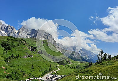 Mountain panorama trentino, Italy, green grass and blue sky Stock Photo