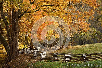 Mountain pastures with split rail fence. Stock Photo