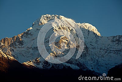 Mountain peak Annapurna South At Sunrise In Himalayas Nepal Stock Photo