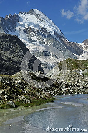 Mountain pool and Dent d'Herens Stock Photo