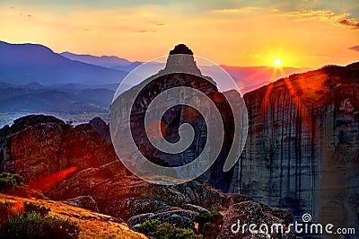 Mountain range in the rays of sunrise. Stock Photo