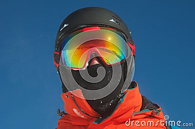A mountain range reflected in the ski mask Stock Photo