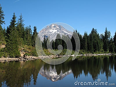 Mountain reflected in lake Stock Photo