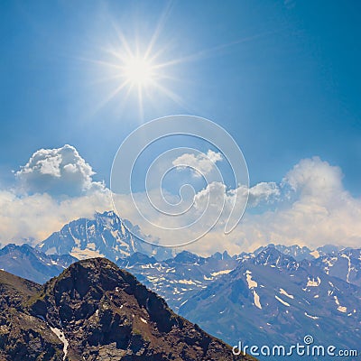 mountain ridge in snow at sunny day Stock Photo