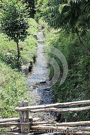 Mountain river and green scenery. Transfagarasan road. Romania Stock Photo