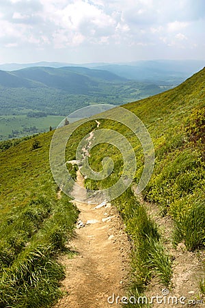 Mountain road landscape, blue sky and white clouds, Poland Stock Photo