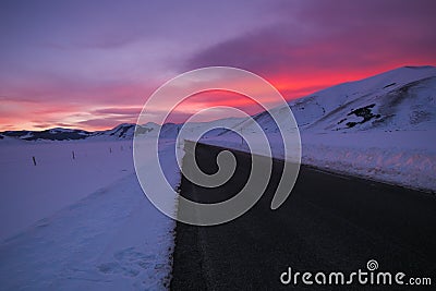 Mountain road in the Pian Grande during romantic dusk Stock Photo