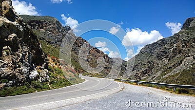 The mountain road runs through the Kourtaliotiko gorge in Crete Stock Photo