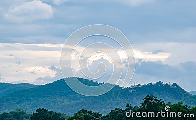mountain scenery and buddha image on the top Stock Photo