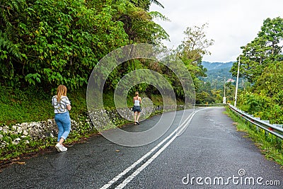 Mountain serpentine asphalt road in the Asian mountain jungle Editorial Stock Photo