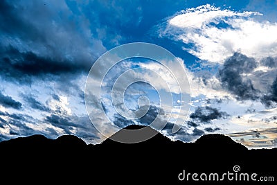 Mountain silhouette in ViÃ±ales valley view in Cuba. Unreal nature with lakes, mountain, trees, wildlife. Gorgeus sky. Stock Photo