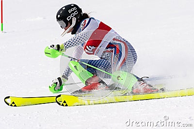 Mountain skier skiing down mount slope. Russian Alpine Skiing Championship, slalom Editorial Stock Photo