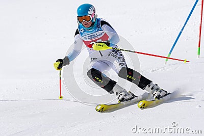 Mountain skier skiing down mountain slope. Russian Alpine Skiing Cup, slalom Editorial Stock Photo