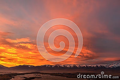 Mountain sky sunset fiery clouds Stock Photo