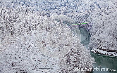 Mountain and snow with local train Stock Photo