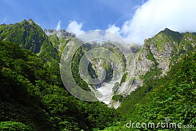 Mountain and snowy valley Stock Photo