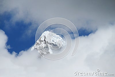 Mountain summit in clouds Stock Photo