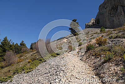 Mountain track on scree slope, Spain Stock Photo