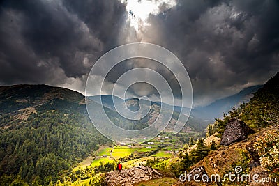 Mountain Valley with sunbeams in cloudy sky Editorial Stock Photo