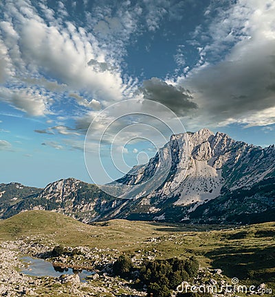 Mountain valley during sunrise. Natural summer landscape. Mountain peak green nature scenery. green hill landscape Stock Photo