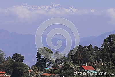mountain village and terrace farming on slopes of himalayan foothills near darjeeling hill station Stock Photo