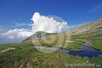 Mountain water spring Stock Photo