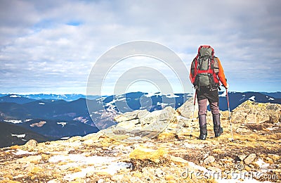 Mountaineer with a backpack. Stock Photo