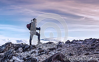Mountaineer profile picture on top of mountain Stock Photo