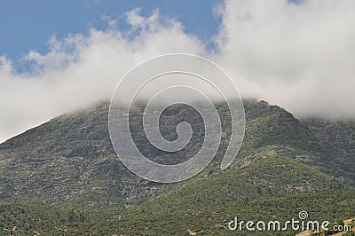 Mountains on the background of sky. Vertices covered with snow. Tourism Stock Photo