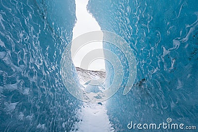 Mountains with clouds on Antarctica. Glaciers, icebergs and ice caves of Southern hemisphere. Global climate change on Earth. Stock Photo