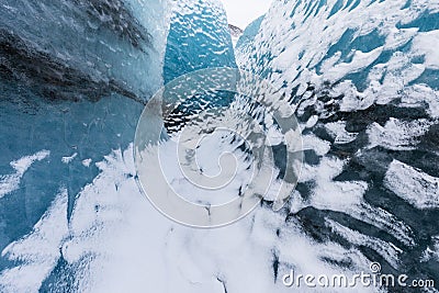 Mountains with clouds on Antarctica. Glaciers, icebergs and ice caves of Southern hemisphere. Global climate change on Earth. Stock Photo